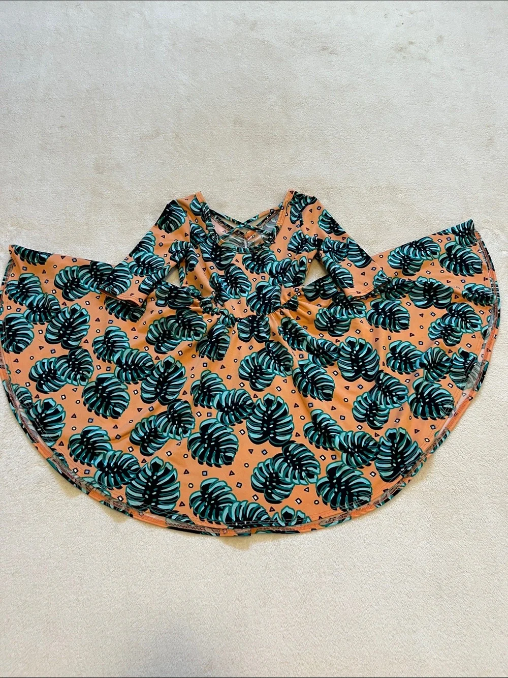 Dot Dot Smile | Little Girls Peach Monstera Leaf Dress 3/4